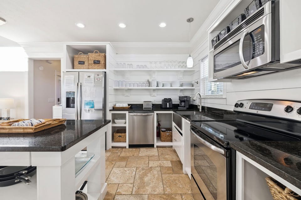 Your fully equipped kitchen features granite counters, stainless appliances, and thoughtful storage—perfect for cooking memorable meals together.