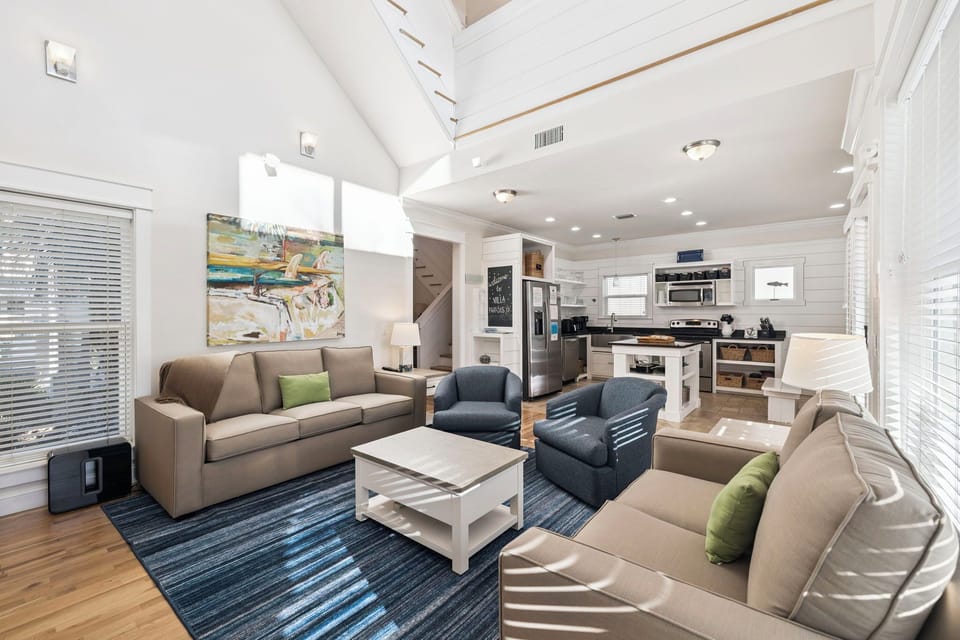 Relax in your bright, open living space with comfortable seating and a fully equipped modern kitchen just steps away.
