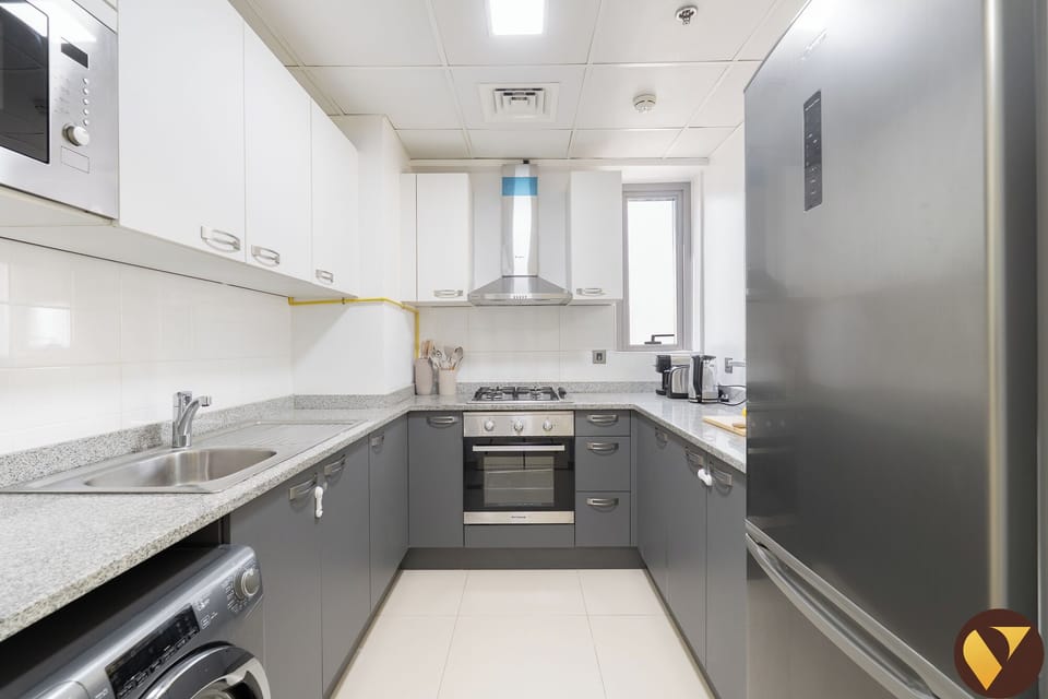 Luxury Apartment, Balcony, City View | Private kitchen | Full-size fridge, microwave, oven, stovetop