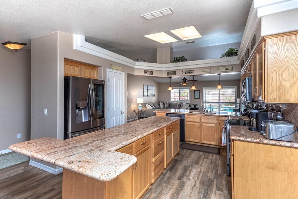 Extended kitchen and dining flow with plenty of room for families and groups.