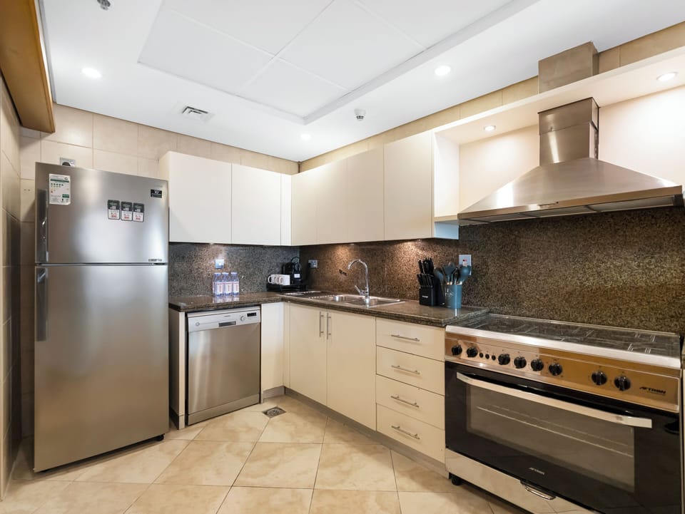 Signature Penthouse, Beach View | Private kitchen | Coffee/tea maker, electric kettle