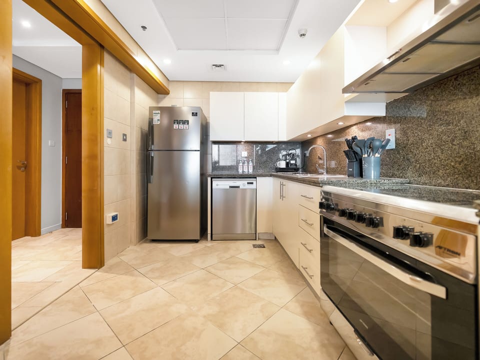 Signature Penthouse, Beach View | Private kitchen | Coffee/tea maker, electric kettle