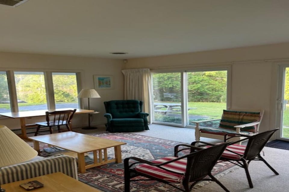 Spacious sitting room with sliding doors to backyard