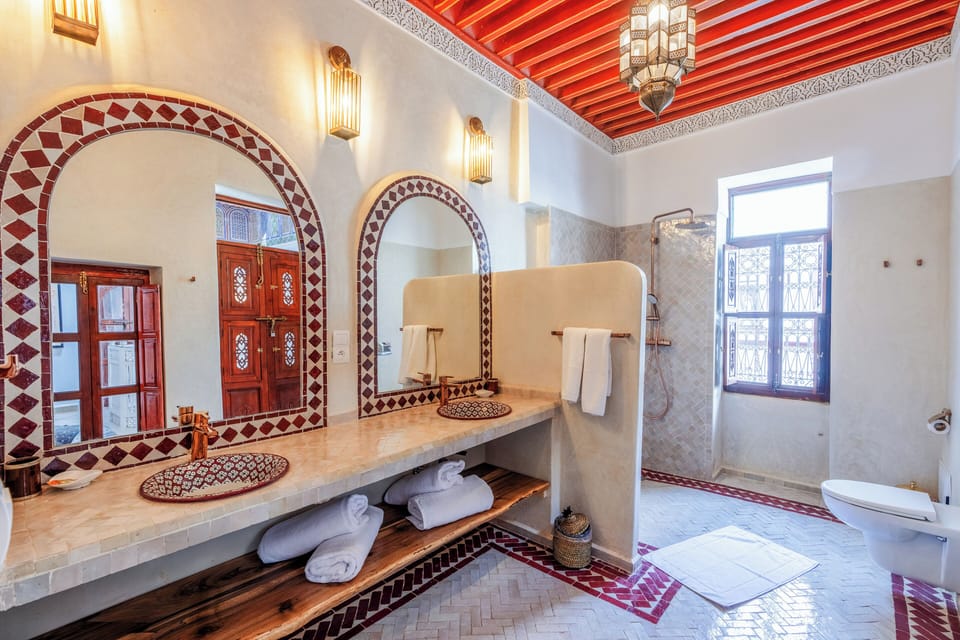Premium Quadruple Room, Courtyard View | Bathroom | Shower, hair dryer, towels, soap