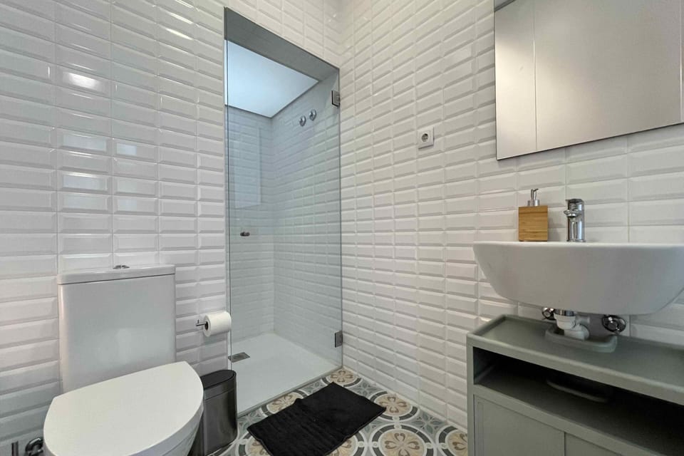 Family Room, City View | Bathroom | Shower, hair dryer, towels, soap