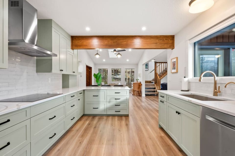 Full kitchen with a drip & Keurig coffee machine, crockpot/slow cooker, bar fridge, and all essentials (coffee grounds, sugar, tea, ketchup, mustard & relish.)