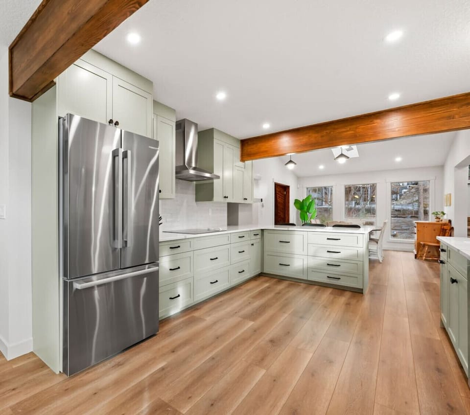 Full kitchen with a drip & Keurig coffee machine, crockpot/slow cooker, bar fridge, and all essentials (coffee grounds, sugar, tea, ketchup, mustard & relish.)