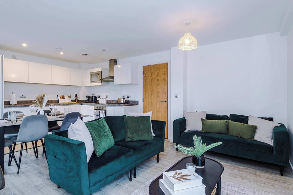 Living Room: Stylish retreat with vibrant decor, plush seating, and stunning views from the balcony!