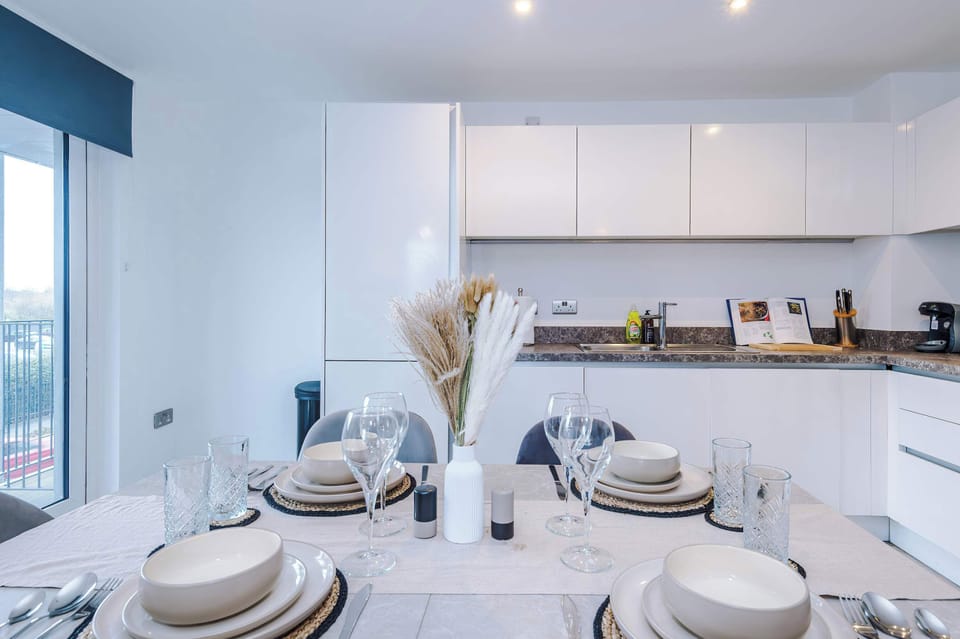 Dining Room: Bright and modern, perfect for meals and gatherings with a stylish touch!