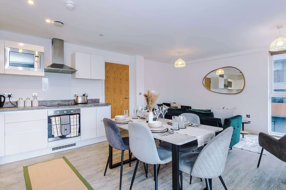 Dining Room: Bright and inviting space for memorable meals with modern decor and lovely views!