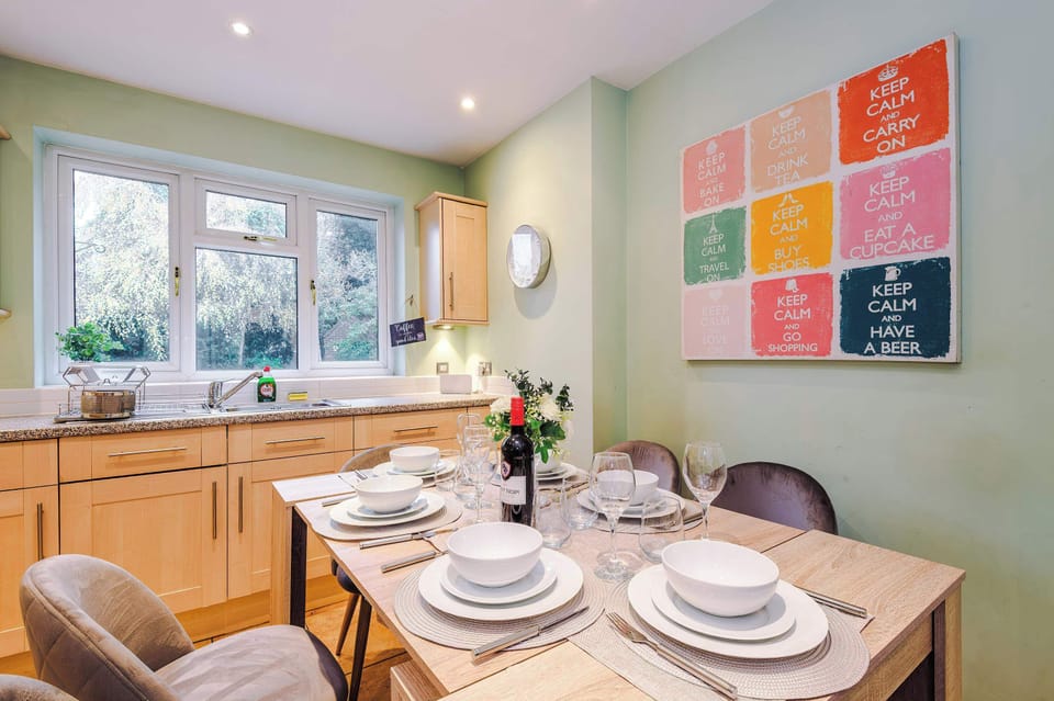 Dining Room: Dine in style with delightful decor and a scenic garden view! Perfect for gatherings.
