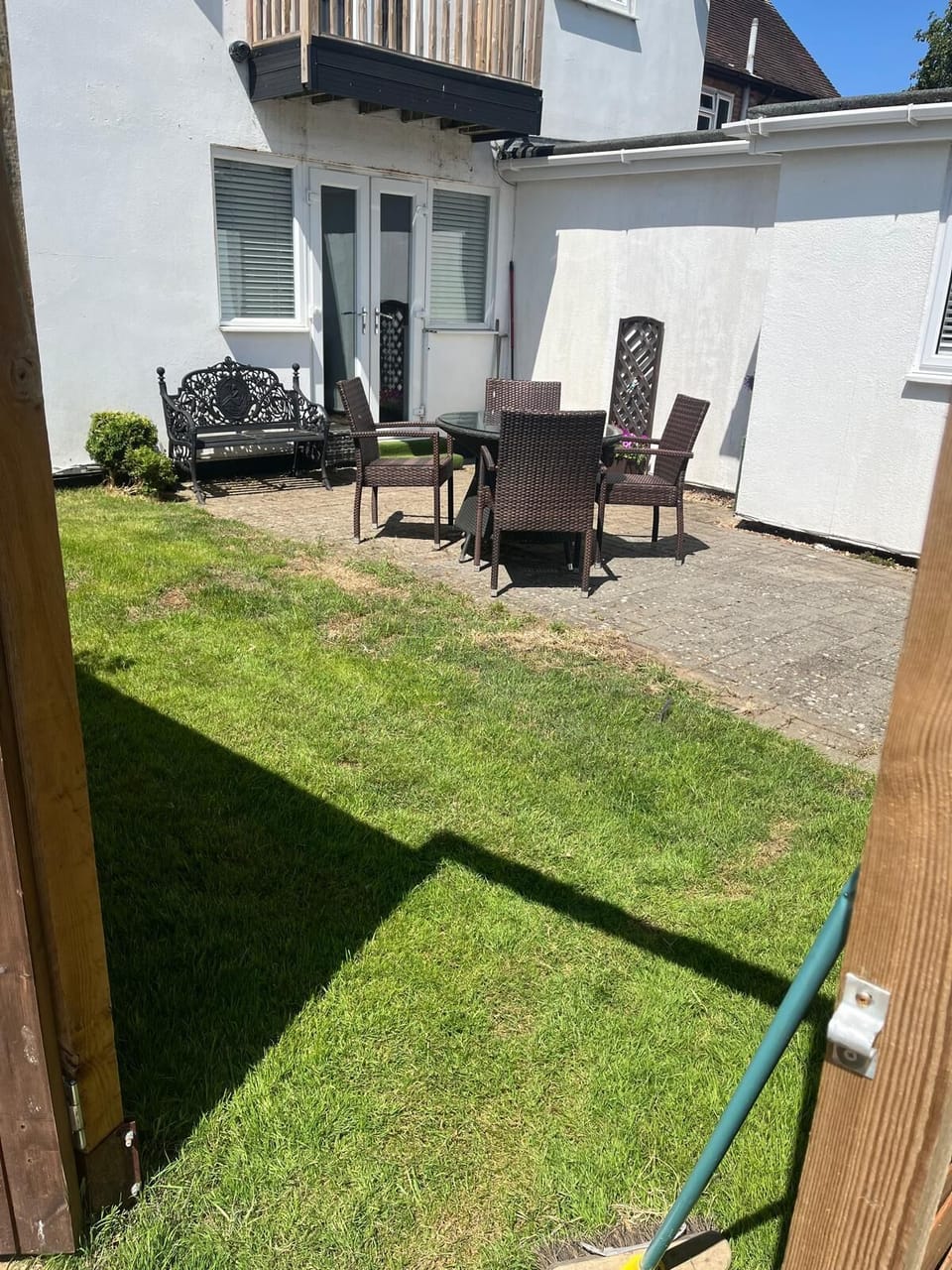 Outdoor Patio: Enjoy al fresco dining in your private garden oasis, perfect for sunny days!