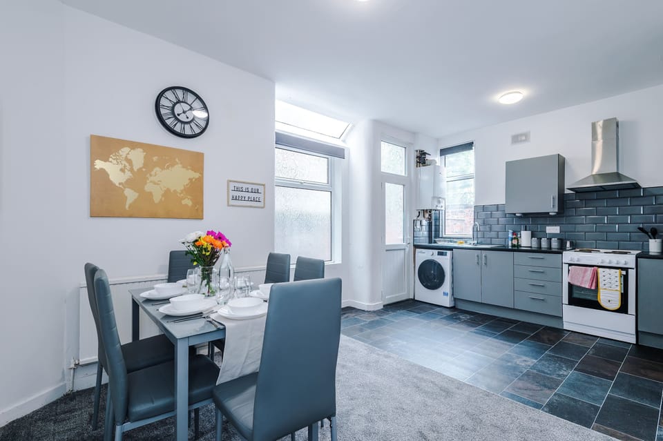 Dining Area: Bright and cheerful space for memorable meals with loved ones!