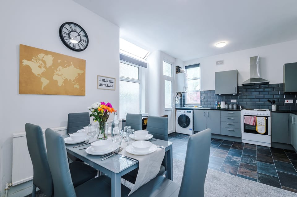 Dining Room: Enjoy meals in style with a sunlit space perfect for gatherings and good times!