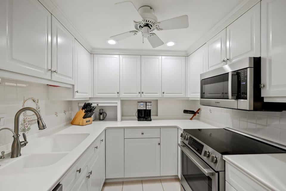 Bright, modern kitchen with sleek appliances and ample storage