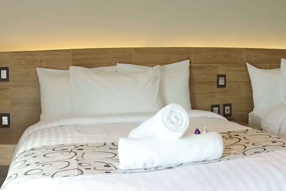Feel pampered with soft towels and smooth, pristine bedding.