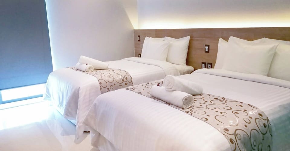 Settle into spotless twin beds for an easy, restful night.