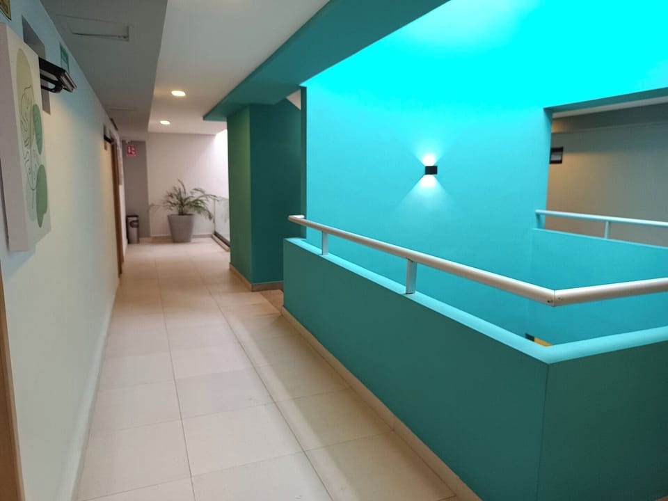 Navigate effortlessly along clean hallways with soft, modern lighting.