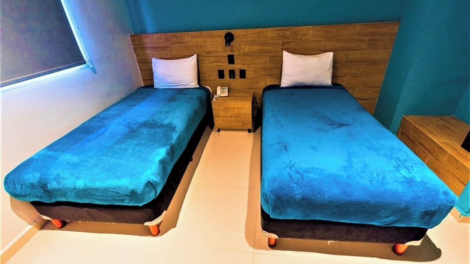 Recharge in a simple, restful setup made for deep sleep.