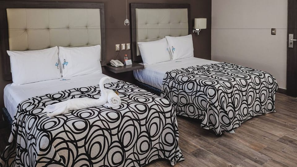 Enjoy extra sleeping space with two comfortable beds for friends.