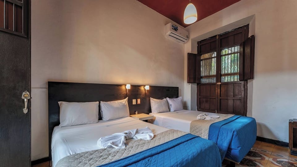Stretch out comfortably with bright linens, warm lights, and AC