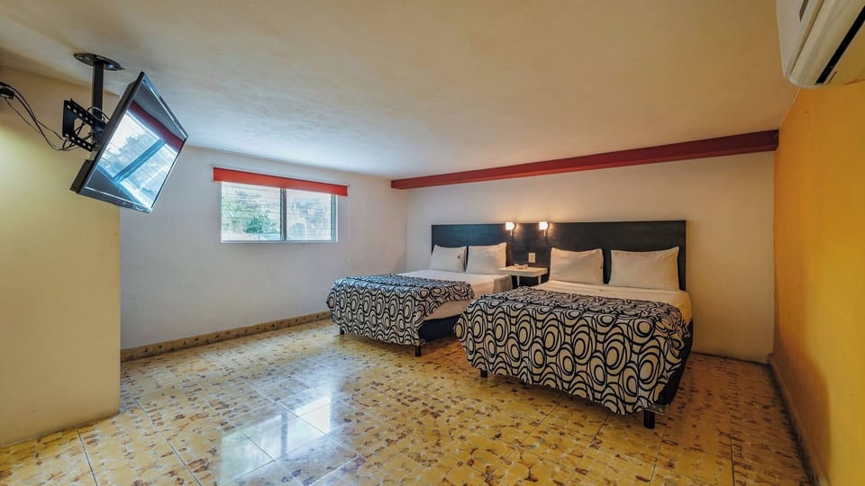 Relax in a bright, airy bedroom with room to breathe.