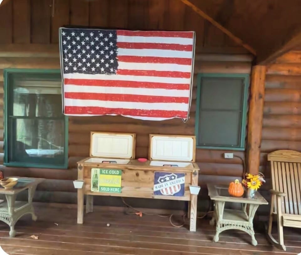 Large TV and coolers on Breezeway