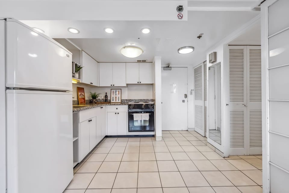 Kitchen is fully equipped with essentials for home cooking.  Full size refrigerator, stove/oven, microwave for guest convenience