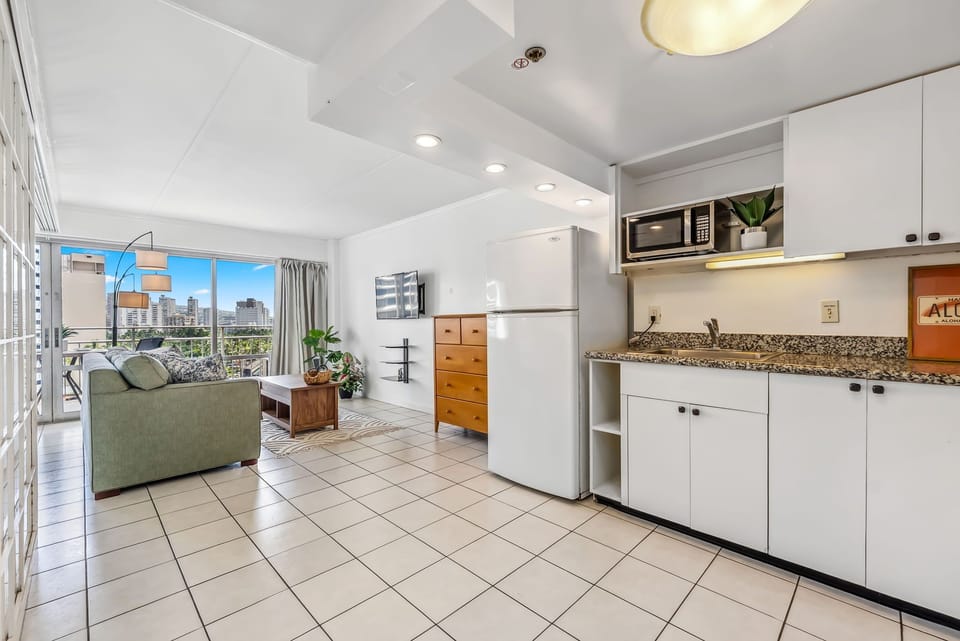 The kitchen is fully equipped with all the basics you need to enjoy home cooking during your stay, including a full size refrigerator, stove, oven, microwave, coffee maker, toaster, rice cooker, and all the basic cookware, dishware, and utensils. 