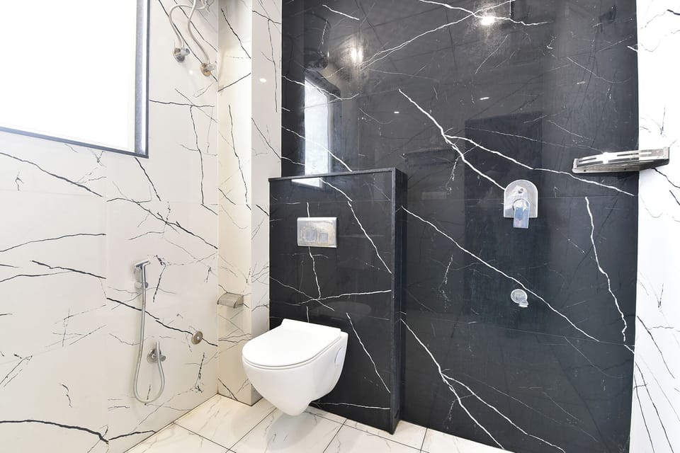 Shower, rainfall showerhead, towels