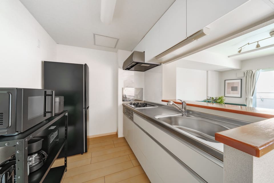 Apartment | Private kitchen | Fridge, microwave, stovetop, rice cooker
