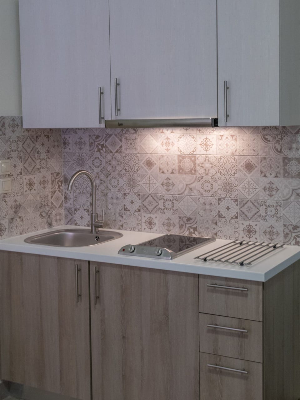 Mini-fridge, stovetop, electric kettle, toaster