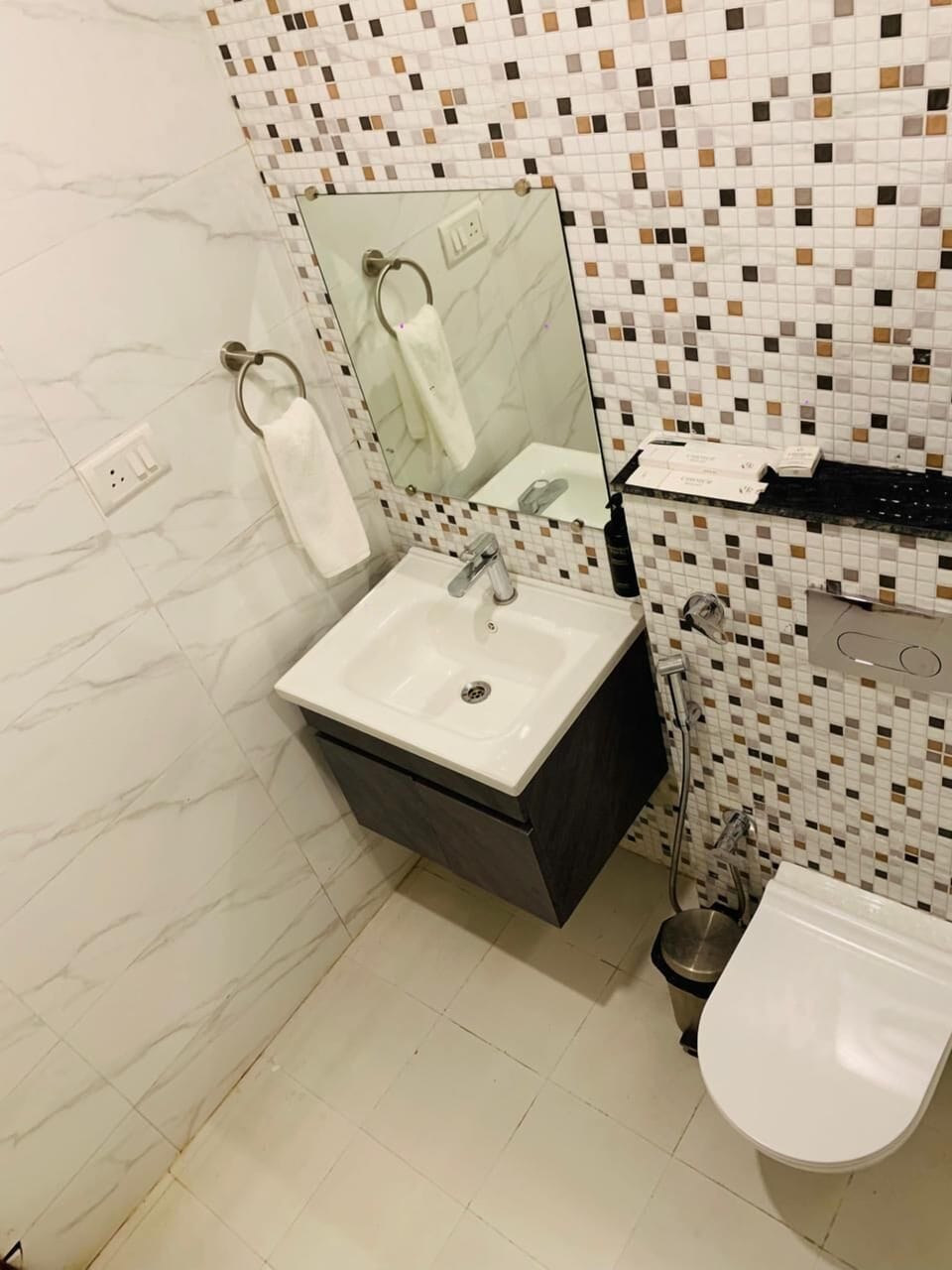 Shower, slippers, towels, soap