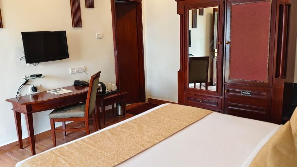 Cottage, Balcony, Garden View | In-room safe, iron/ironing board (on request), WiFi (free)