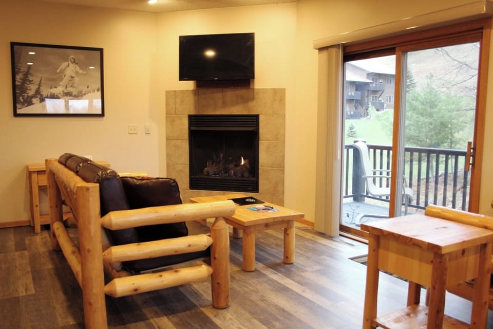 Cozy up by the fireplace for relaxed movie nights.