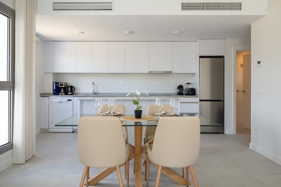 Dining area with open access to the kitchen.