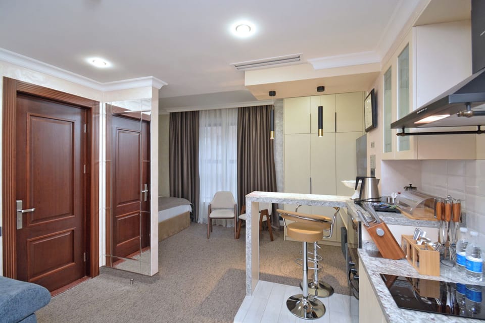 Junior Suite, City View | Private kitchen | Full-size fridge