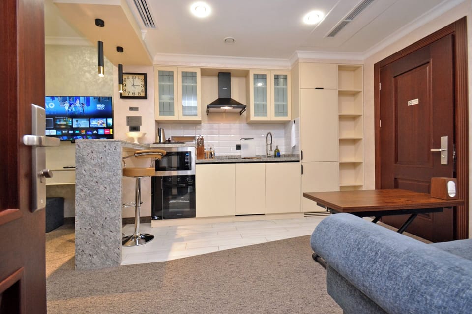 Junior Suite, City View | Private kitchen | Full-size fridge