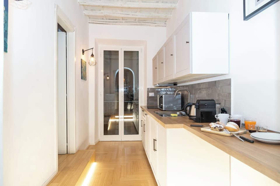 Deluxe Apartment, City View | Private kitchen | Microwave, oven, stovetop, dishwasher