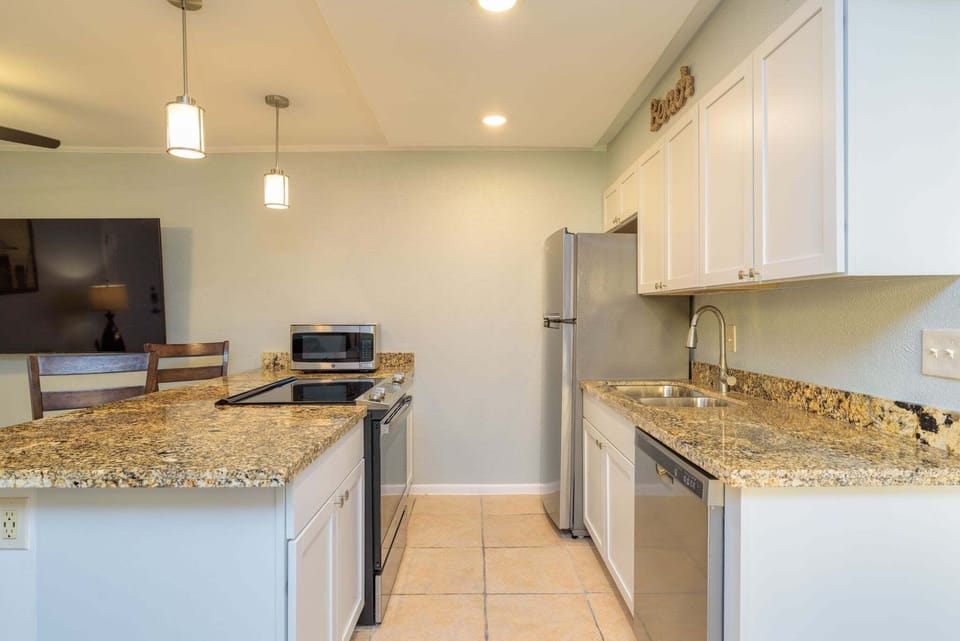 Condo, 1 Bedroom | Private kitchen | Coffee/tea maker, fridge, oven, stovetop