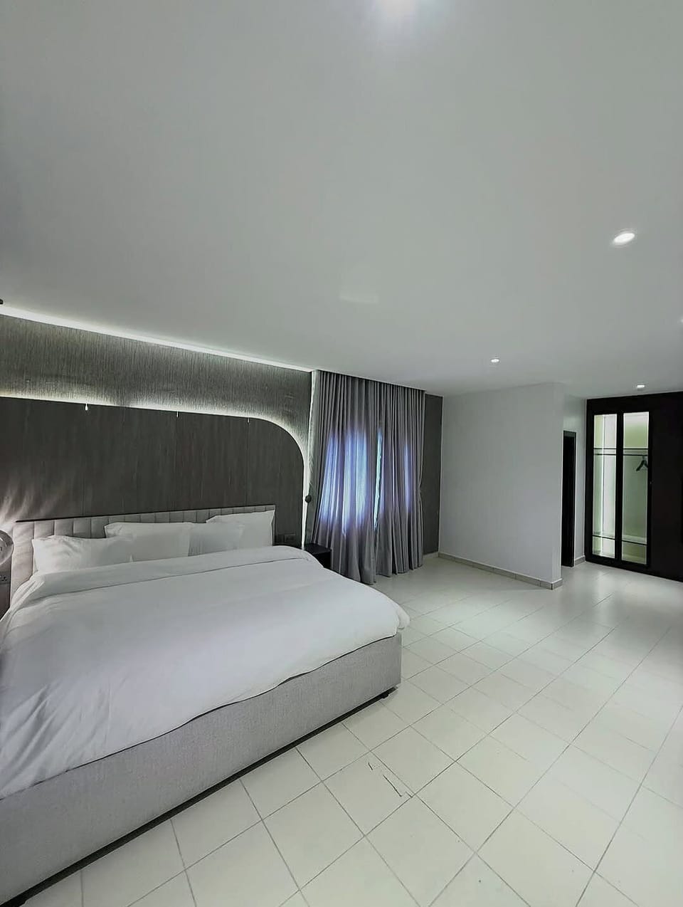 Economy Room, Balcony, City View | Desk, laptop workspace, blackout drapes, soundproofing