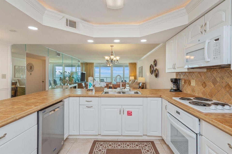 Condo, 2 Bedrooms | Private kitchen | Coffee/tea maker, fridge, oven, stovetop