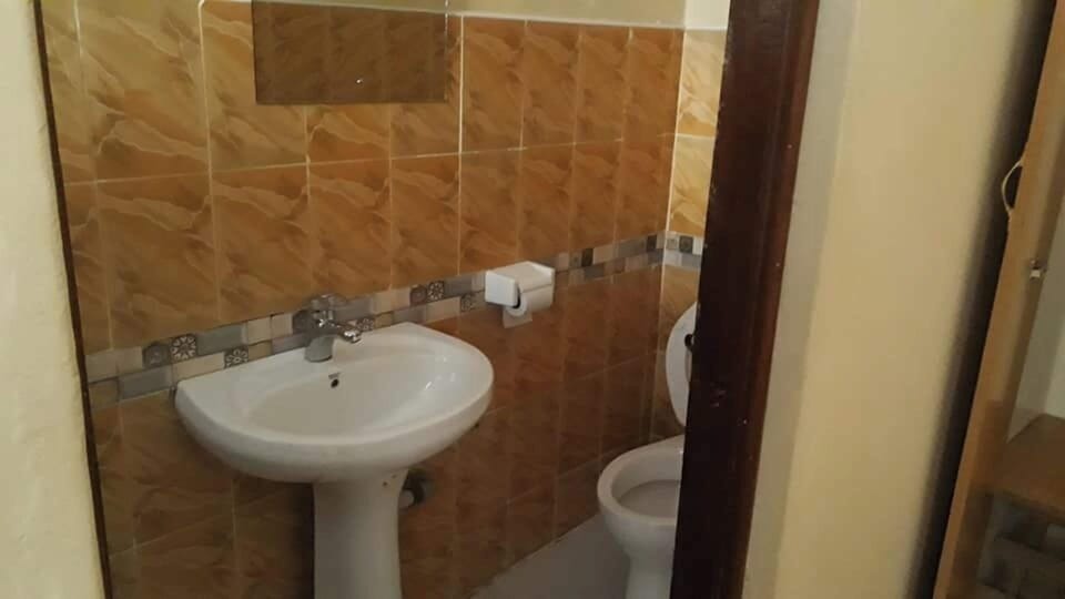 Deluxe Double Room | Bathroom | Shower, slippers, towels, soap