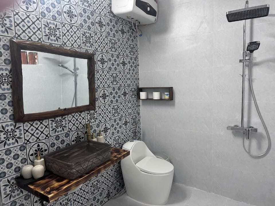 Luxury Double Room, Courtyard View | Bathroom | Shower, designer toiletries, hair dryer, bathrobes