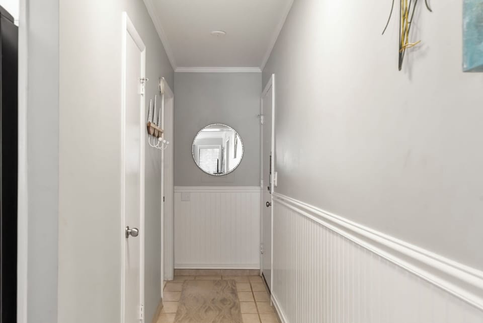 Welcoming entry way of Tilghman Beach & Racquet Club #109