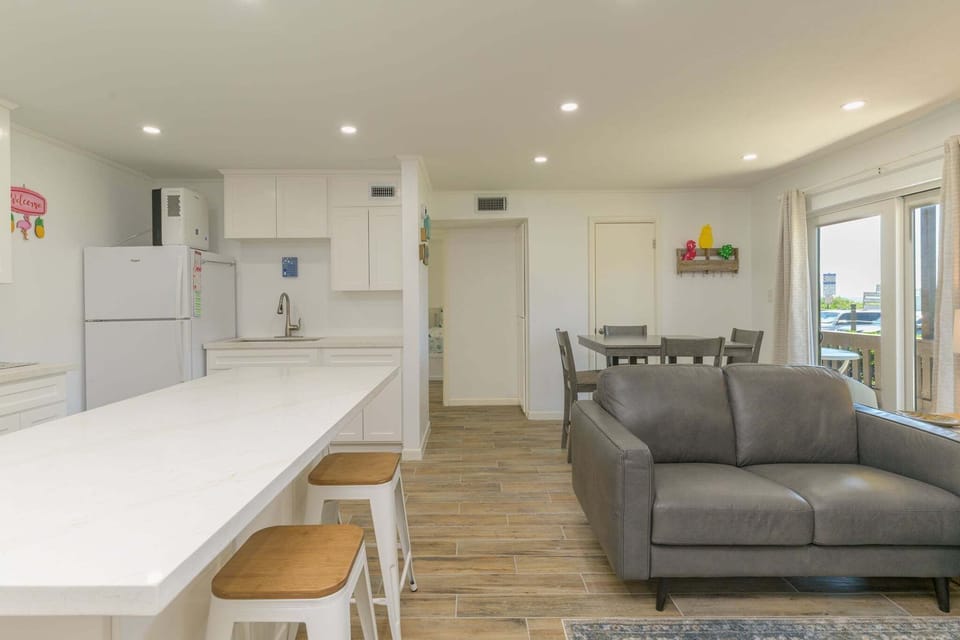Indoors, Floor, Flooring, Furniture, Living Room