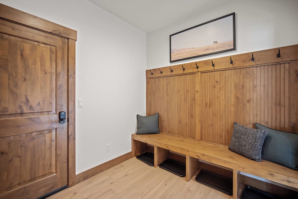 Store your gear and settle in at your private mudroom bench, designed for mountain adventures.
