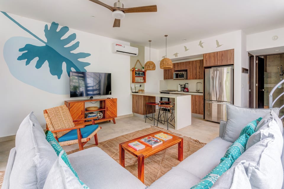 Penthouse, 2 Bedrooms, Hot Tub | Living area | 32-inch Smart TV with digital channels