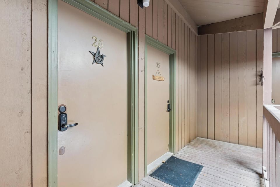 Arrive at your charming retreat through this welcoming entrance with thoughtful nautical touches and rustic wood details.