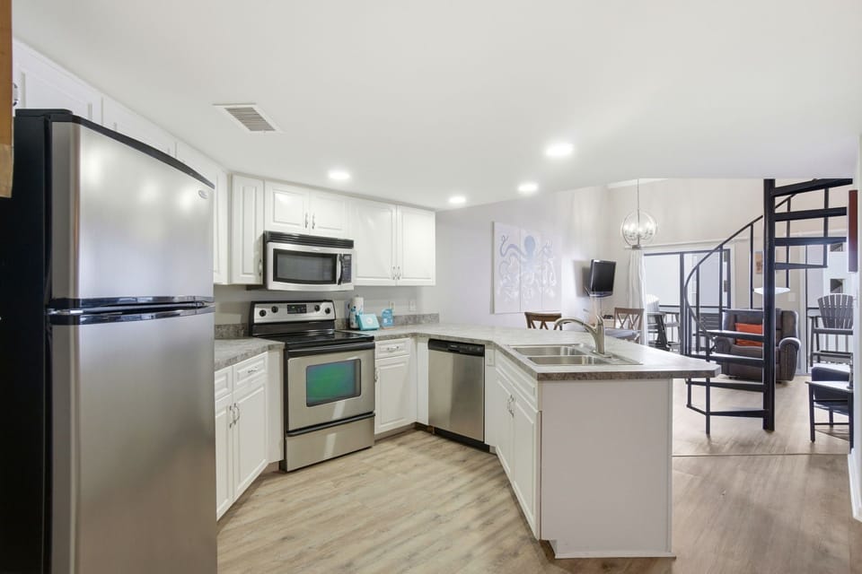 Regatta Condo 304C- Kitchen View to Balcony